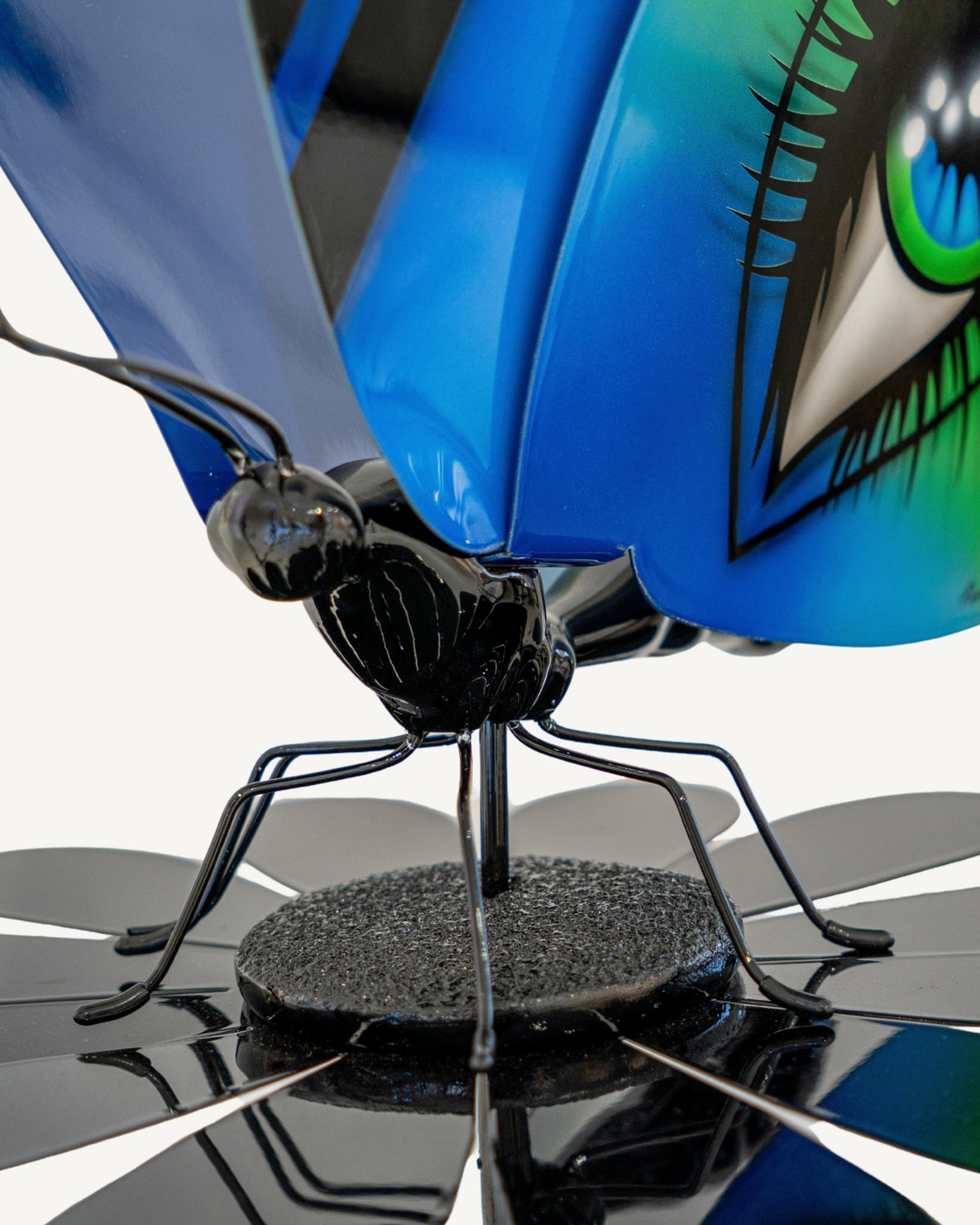 Untitled, steel butterfly sculpture by Pineda Mariscal, body and daisy detail