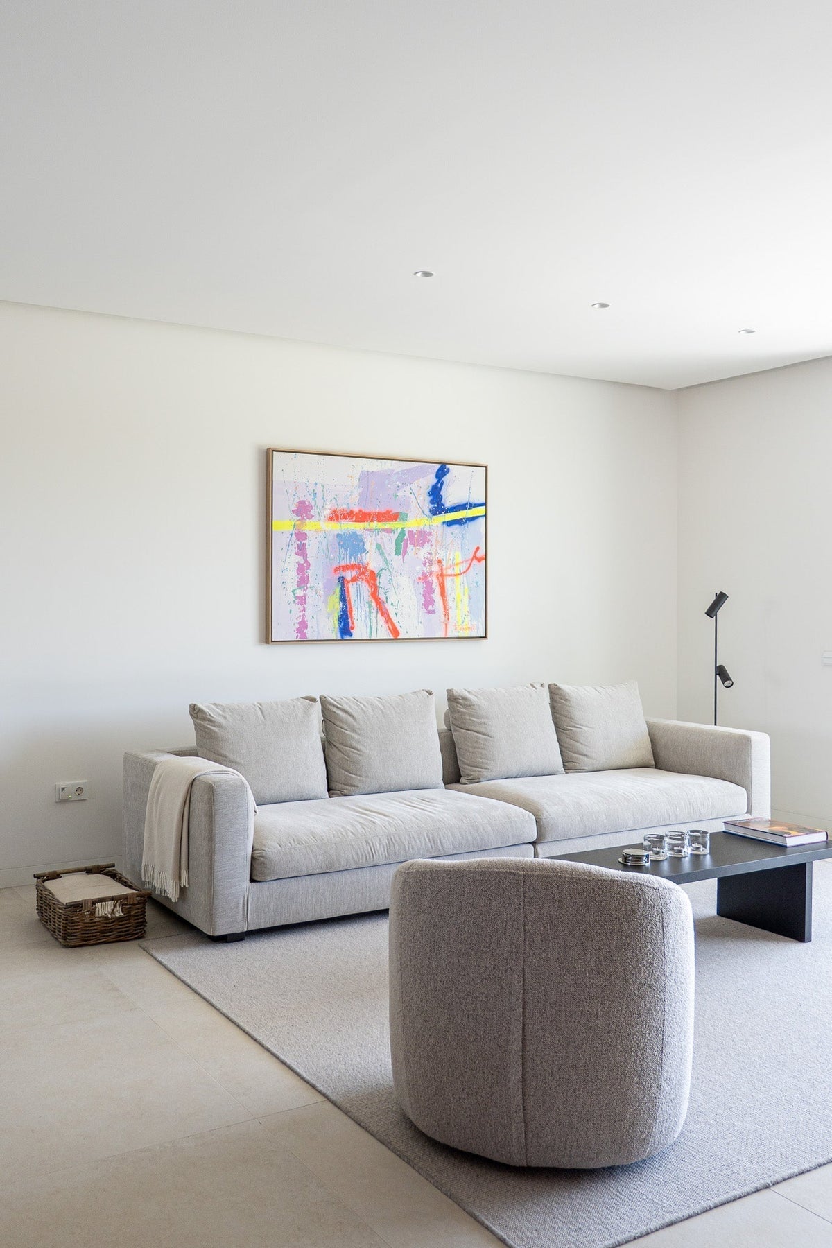 Commissioned Fernanz artwork installed above a sofa, Jaloe Art Gallery project