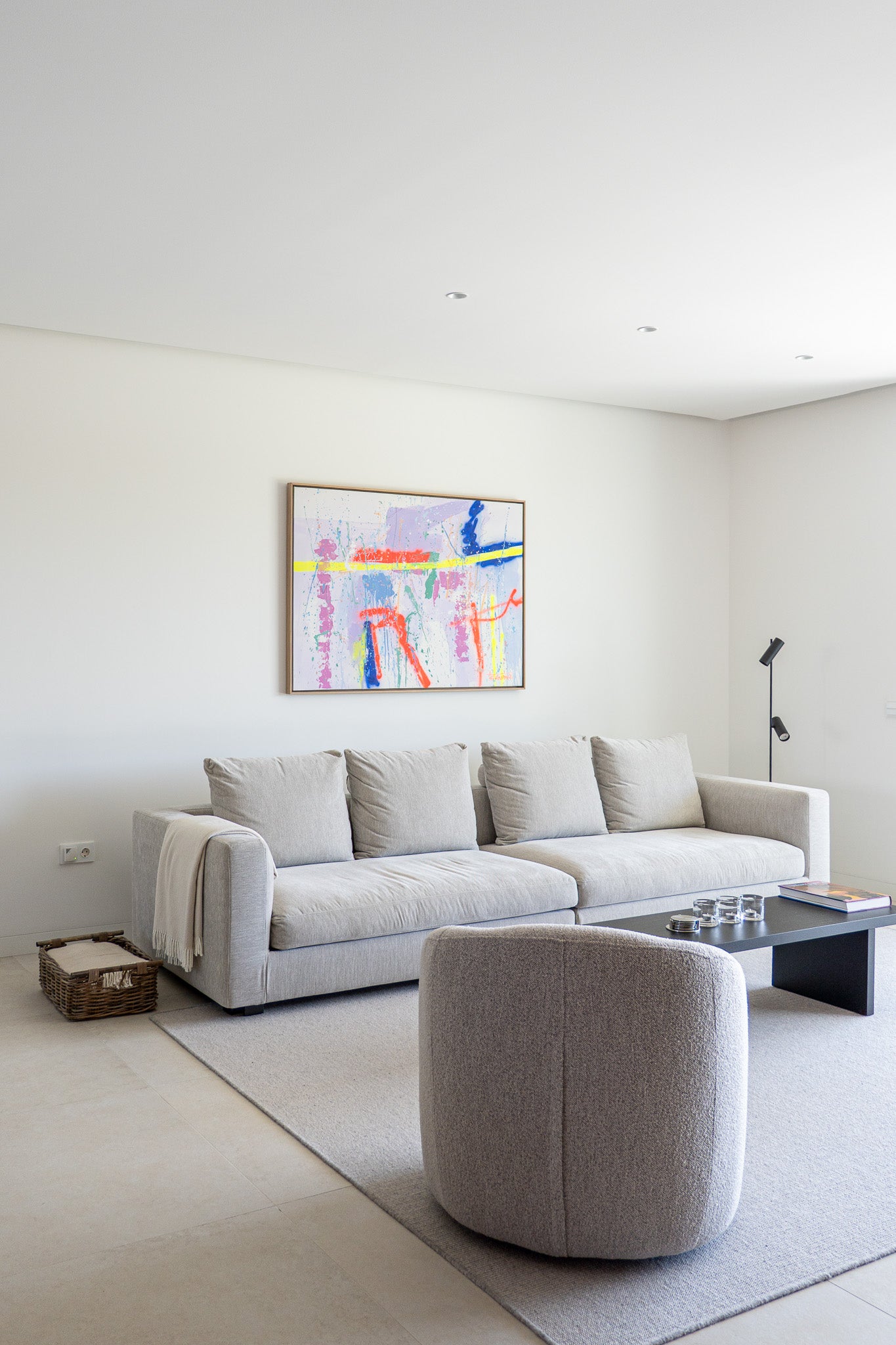 Commissioned Fernanz artwork installed above a sofa